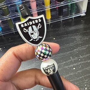 Raiders Themed Pen with Checkered Design